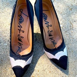 Black heels with a pop of white